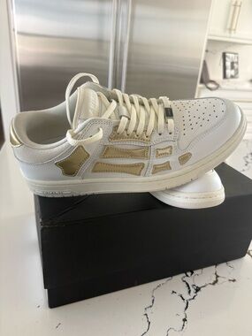 AMIRI Off-White Leather Low-Top Sneakers with Gold Accent